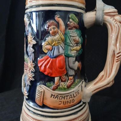 Two vintage German lidded porcelain beer steins - Gerz West Germany marked and Swiss Musical Mapsa