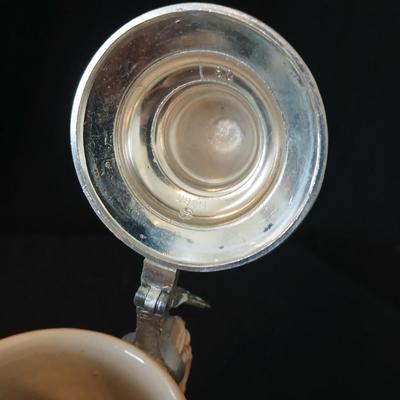 Two vintage German lidded porcelain beer steins - Gerz West Germany marked and Swiss Musical Mapsa