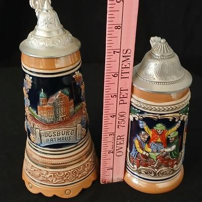 Two vintage German lidded porcelain beer steins - Gerz West Germany marked and Swiss Musical Mapsa