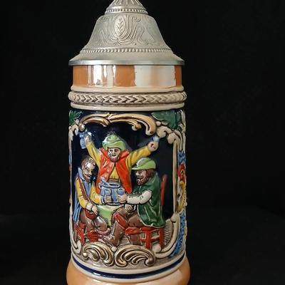 Two vintage German lidded porcelain beer steins - Gerz West Germany marked and Swiss Musical Mapsa
