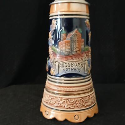 Two vintage German lidded porcelain beer steins - Gerz West Germany marked and Swiss Musical Mapsa