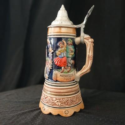 Two vintage German lidded porcelain beer steins - Gerz West Germany marked and Swiss Musical Mapsa