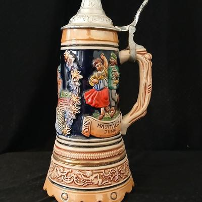 Two vintage German lidded porcelain beer steins - Gerz West Germany marked and Swiss Musical Mapsa