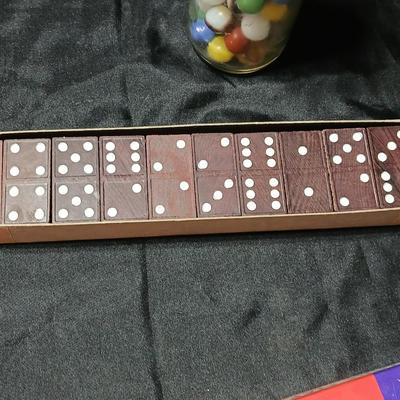 Jar of vintage marbles with a Vintage Halsam lone star double six Dominoes game