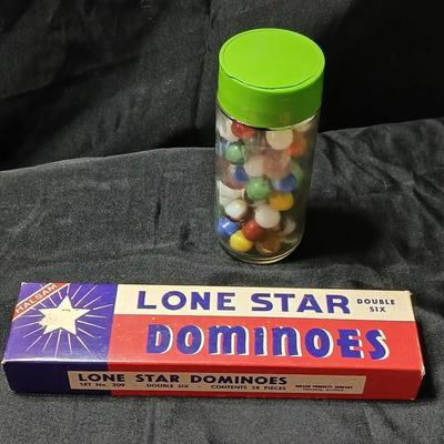 Jar of vintage marbles with a Vintage Halsam lone star double six Dominoes game