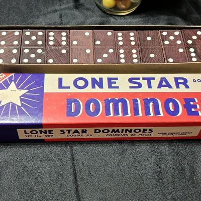 Jar of vintage marbles with a Vintage Halsam lone star double six Dominoes game