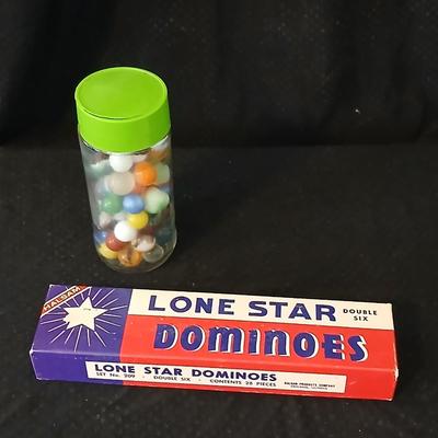 Jar of vintage marbles with a Vintage Halsam lone star double six Dominoes game