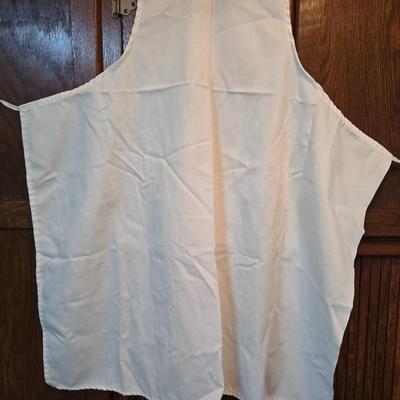 Stainless steel bowls and a strainer with an apron