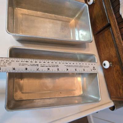 Assortment of baking pans - Cookie sheet - bread pans - Apron and more