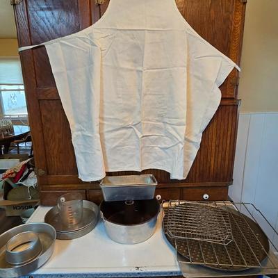 Assortment of baking pans - Cookie sheet - bread pans - Apron and more