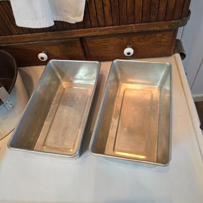 Assortment of baking pans - Cookie sheet - bread pans - Apron and more