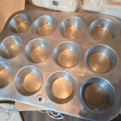 Assortment of baking pans - Bundt cake - Bread - Cookie sheets - and more