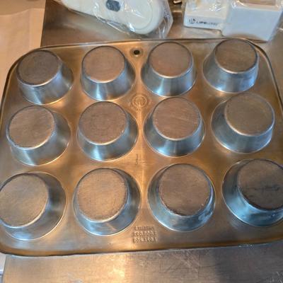 Assortment of baking pans - Bundt cake - Bread - Cookie sheets - and more