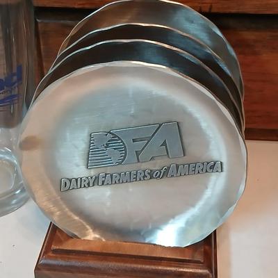 Four Agland drinking glasses and four FA Dairy farmers of America Wendell August handmade pewter coasters