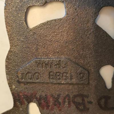 Cow canister - Ceramic cow themed crock - copper-toned cast iron trivet in the shape of a cow - and more