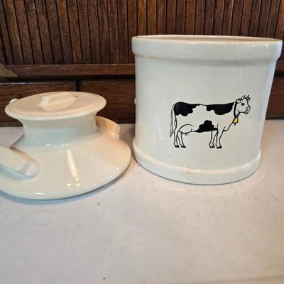 Cow canister - Ceramic cow themed crock - copper-toned cast iron trivet in the shape of a cow - and more
