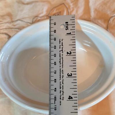 Vintage Le Creuset heritage-style Decoware mini Dutch oven or casserole dish in the signature Flame Orange color.