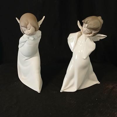 Two Llardo angel figures - Both with flaws -
