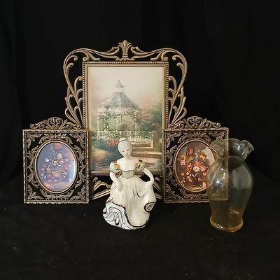 Framed print of the painting "The Hidden Gazebo" by Thomas Kinkade - Two ornate brass picture frames featuring a floral still...