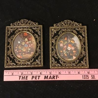 Framed print of the painting "The Hidden Gazebo" by Thomas Kinkade - Two ornate brass picture frames featuring a floral still...