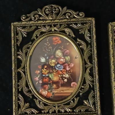 Framed print of the painting "The Hidden Gazebo" by Thomas Kinkade - Two ornate brass picture frames featuring a floral still...