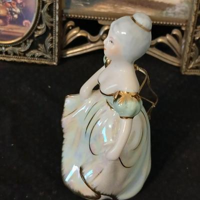 Framed print of the painting "The Hidden Gazebo" by Thomas Kinkade - Two ornate brass picture frames featuring a floral still...