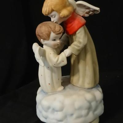Two angel musical figures - and two small Enesco pocelain figures