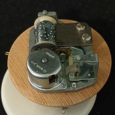 Two angel musical figures - and two small Enesco pocelain figures