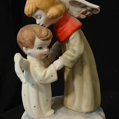 Two angel musical figures - and two small Enesco pocelain figures