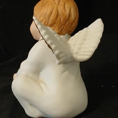 Two angel musical figures - and two small Enesco pocelain figures