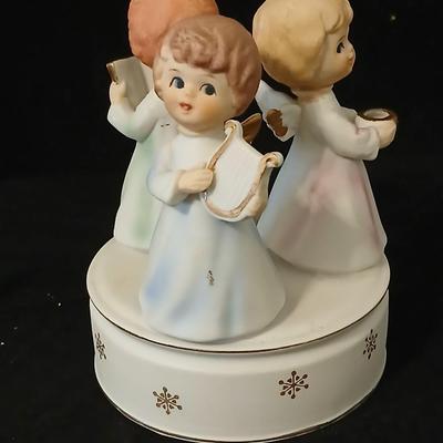 Two angel musical figures - and two small Enesco pocelain figures
