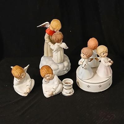 Two angel musical figures - and two small Enesco pocelain figures