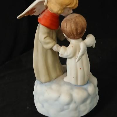 Two angel musical figures - and two small Enesco pocelain figures