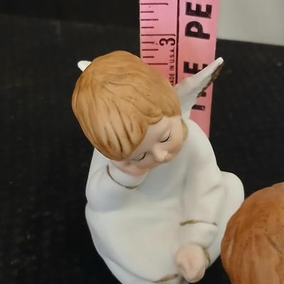 Two angel musical figures - and two small Enesco pocelain figures