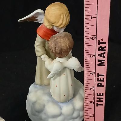 Two angel musical figures - and two small Enesco pocelain figures