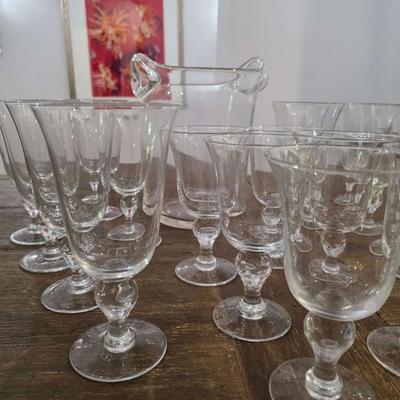 Sale Photo Thumbnail #109: This is a lot including a glass ice bucket and 19 goblets, 2 different sizes. Please see measurements in pictures. The art you may see in the background is NOT included. You are bidding on the lot meaning you must pay for and take the entire lot.