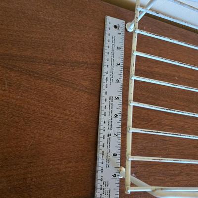 Multi - tiered Mid-century modern metal plant stand with glass vases and a glass flower frog