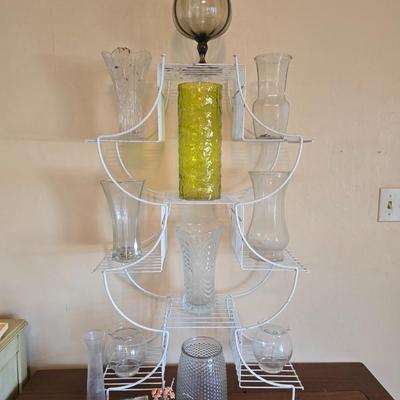 Multi - tiered Mid-century modern metal plant stand with glass vases and a glass flower frog