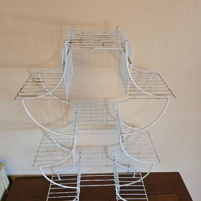 Multi - tiered Mid-century modern metal plant stand with glass vases and a glass flower frog