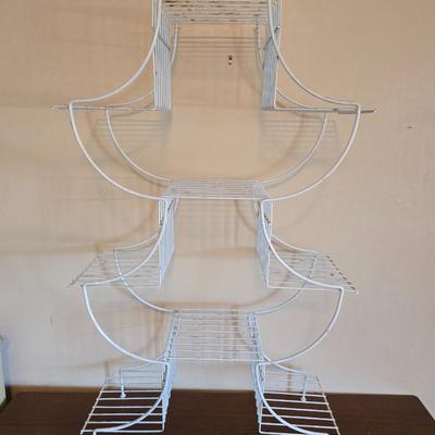 Multi - tiered Mid-century modern metal plant stand with glass vases and a glass flower frog