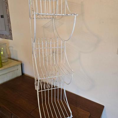 Multi - tiered Mid-century modern metal plant stand with glass vases and a glass flower frog