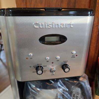 Brand new Cusinart coffee maker with a collection of mugs - including two insulated mugs and a turntable / lazy Susan