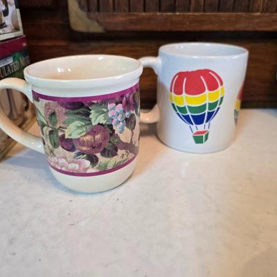 Brand new Cusinart coffee maker with a collection of mugs - including two insulated mugs and a turntable / lazy Susan