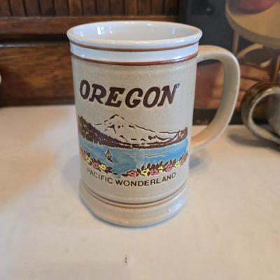 Brand new Cusinart coffee maker with a collection of mugs - including two insulated mugs and a turntable / lazy Susan