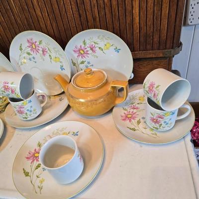 Tea time! Lillian Vernon tea pot - with other tea pots and a set of mid-century demitasse cup and saucer set with a floral pattern.