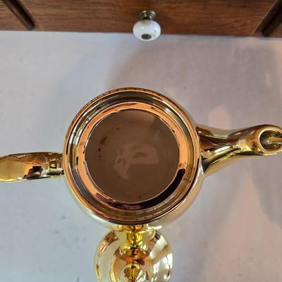 Tea time! Lillian Vernon tea pot - with other tea pots and a set of mid-century demitasse cup and saucer set with a floral pattern.