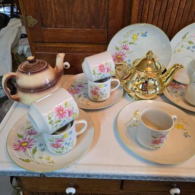 Tea time! Lillian Vernon tea pot - with other tea pots and a set of mid-century demitasse cup and saucer set with a floral pattern.