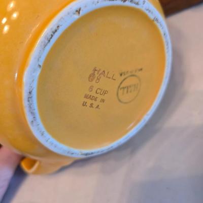 Tea time! Lillian Vernon tea pot - with other tea pots and a set of mid-century demitasse cup and saucer set with a floral pattern.