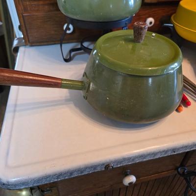 vintage, mid-century modern avocado green fondue pots - orange fondue pot - and a retro General Electric (GE) electric skillet.