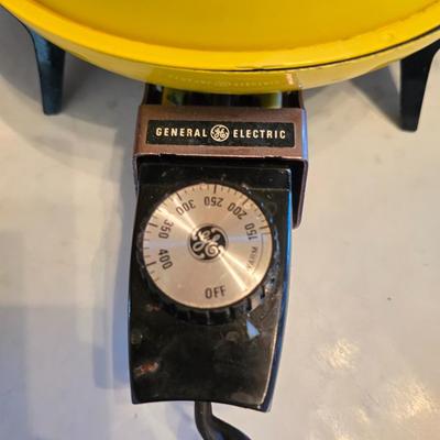 vintage, mid-century modern avocado green fondue pots - orange fondue pot - and a retro General Electric (GE) electric skillet.